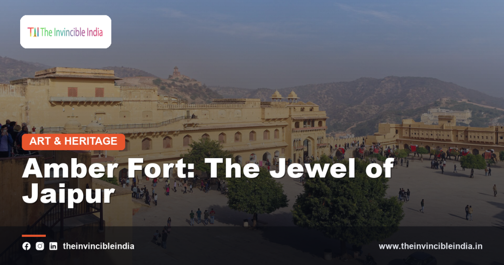 Amber Fort's sandstone courtyards and gateways rising above Maota Lake near Jaipur