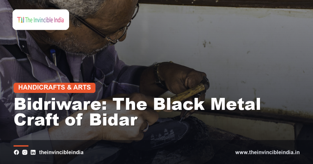 A black Bidriware vessel from Bidar with fine silver inlay designs