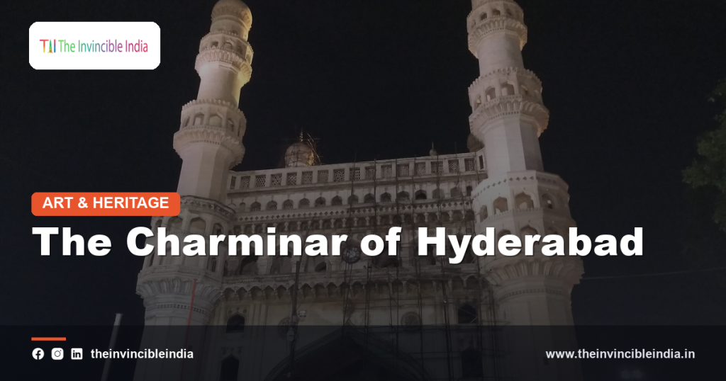 The four grand minarets and arched facade of the Charminar monument in Hyderabad