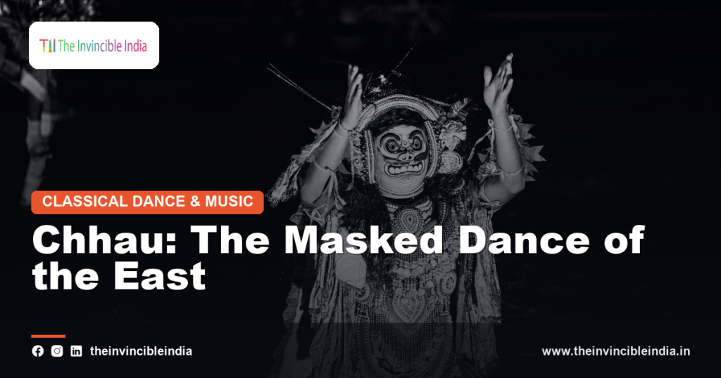A masked Chhau dancer performing a dramatic pose during a festival