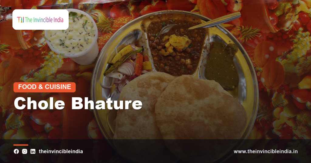 A plate of chole bhature with spiced chickpea curry and fried bread