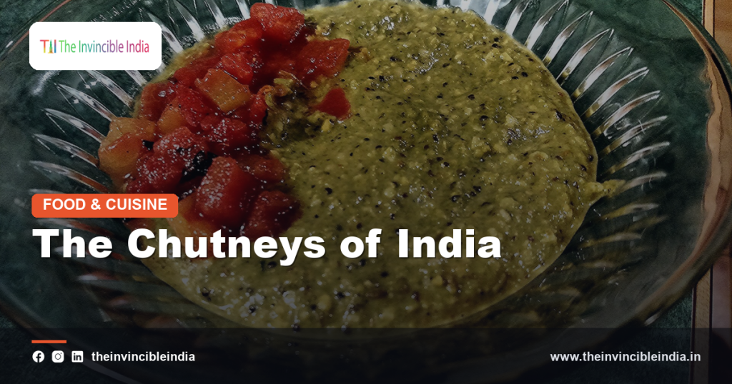 Small bowls of colourful Indian chutneys