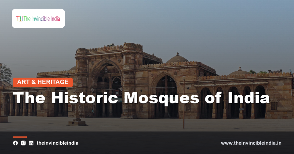 A grand historic Indian mosque with domes, minarets and a courtyard