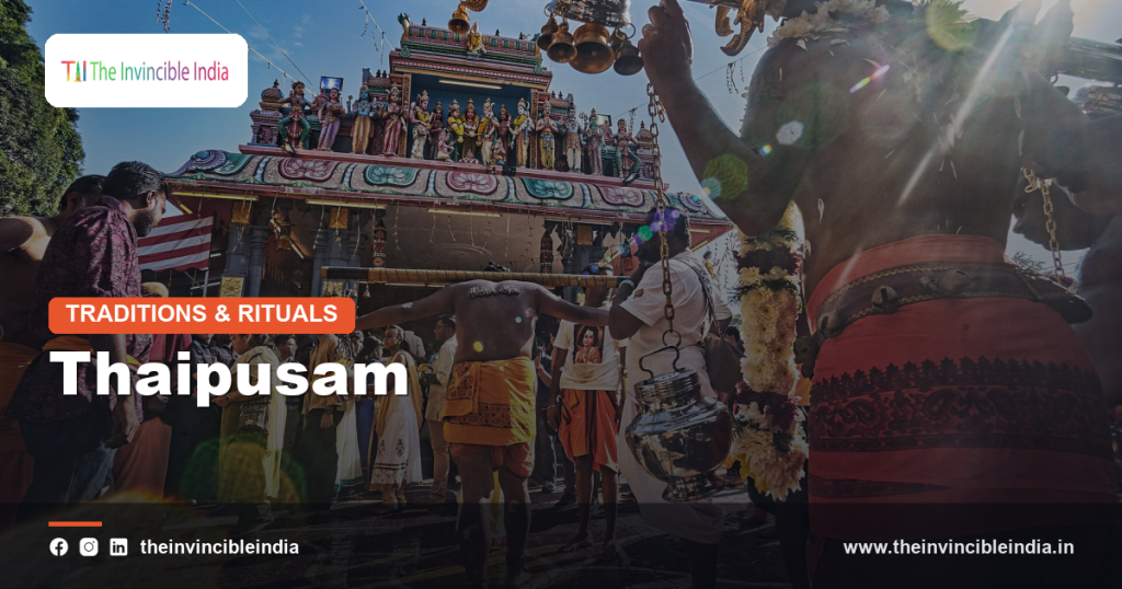 Devotee carrying a decorated kavadi during Thaipusam celebrations