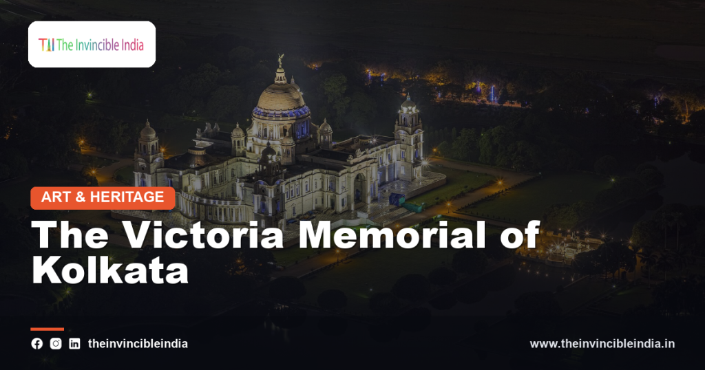 The white marble Victoria Memorial in Kolkata with its central dome reflected in the garden pool
